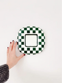 Checker Spiegel